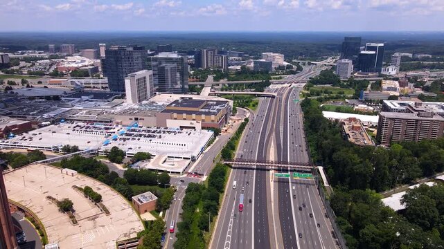 Tysons, Virginia business district from above Office towers, shopping centers, and intersecting major roads.
