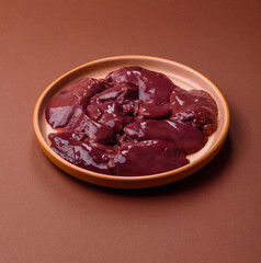 Raw fresh chicken or turkey liver, internal offal of poultry. Raw chicken liver