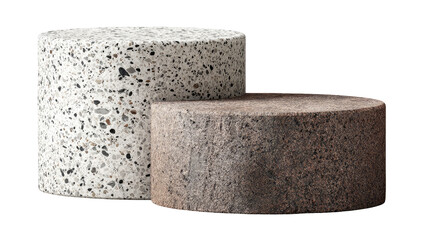 Two cylindrical, speckled concrete-like objects, one light gray, one dark brown, in a studio setting