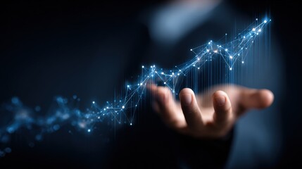 Growth Trajectory Concept: Hand Holding a Digital Graph Illustrating Business Success and Financial Improvement