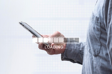 Man holding a smartphone with a digital loading bar and progress indicator overlay. Concept of internet connection, data transfer, mobile technology and digital transformation.