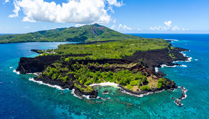Volcanic island with lush greenery, secret turquoise lagoon. Beautiful nature. Travel, exploration