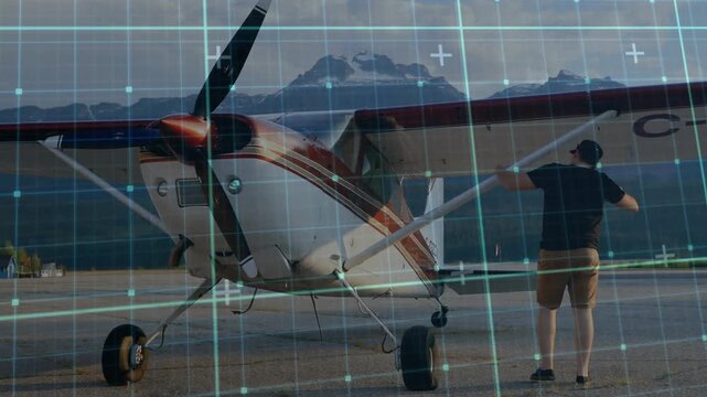 Pilot approaching high-wing plane on lakeside ramp inspecting strut and checking cockpit for safety