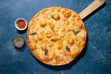 Classic Margherita Pizza with Fresh Mozzarella and Basil isolated on wooden cutting board top view of fast food