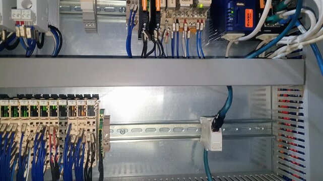 Industrial Electrical Control Panel with Automation Modules.