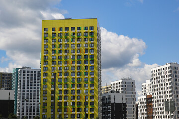 Naklejka premium Facades of houses in the new microdistrict called Buninskie Lugy (