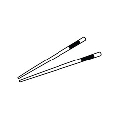 A pair of chopsticks with black and white handles
