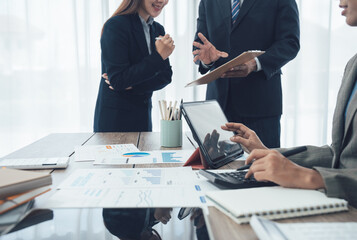 Auditor and accountant team working in office, analyze financial data and accounting record with calculator. Accounting company provide finance and taxation planning for profitable cash flow. Insight