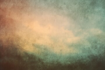 Fototapeta premium Abstract textured background with muted orange, yellow, and teal hues, blending softly; a hazy, cloudy effect, suggestive of a vintage or aged photograph