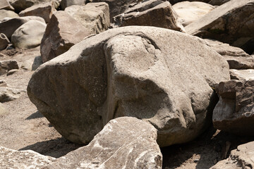Stone texture. Rock fragments. Stones near a mountain river