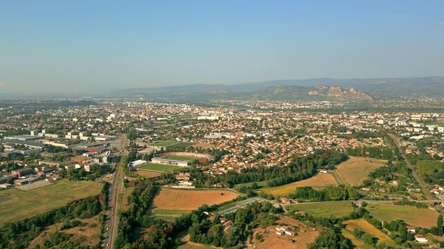 Aerial panorama of Valence city and surrounding landscape in summer, France