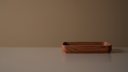 Minimalist wooden tray on a neutral background, simple and elegant home decor object