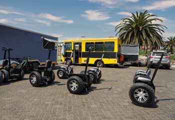 Naklejka premium self balancing scooter for rental to the tourist two wheels electric eco rider, kiosk and food truck, Swakopmund city in Namibia,