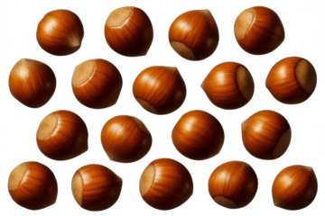 Multiple hazelnuts falling against a transparent background, creating a seamless pattern ideal for food packaging design