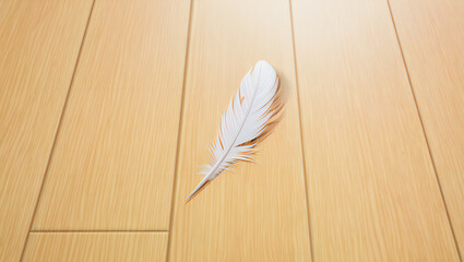 White feather lying on a wooden surface with a soft and gentle appearance