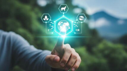 Hand touching glowing earth icon surrounded by nature symbols on a blurred green background view - Powered by Adobe