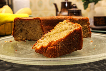 Close Up of Homemade Banana Cake Slice on Glass Plate