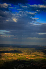 Landscapes in shadow and light seen from the top of Mont Alaric in Aude. Hills and plains of southern France seen from above.