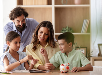 Family bonding during saving money lessons at home