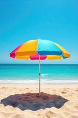A vibrant beach umbrella casts a cool shadow on the warm sand, providing shade on a sunny day The umbrella's bright colors contrast beautifully with the tranquil ocean backdrop , coastal, parasol
