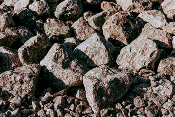 Natural stone texture with cracks, vegetation and dirt, texture background