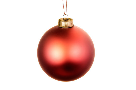 A red ornament hanging from a string