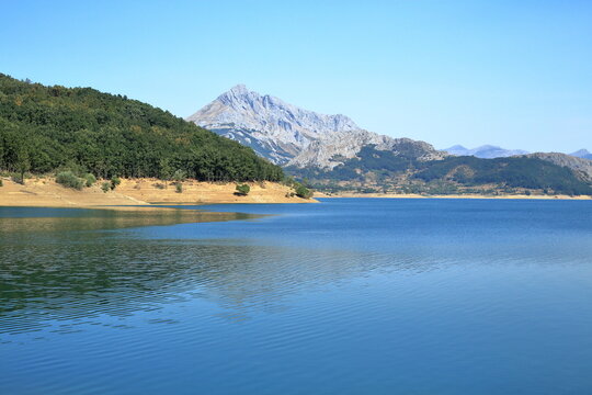 Pe&ntilde;a Susar&oacute;n Reflected in the Porma Reservoir