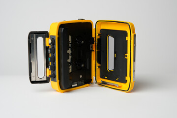 Retro cassette player with earbuds, 1990s