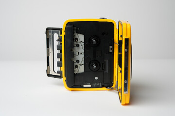 Retro cassette player with earbuds, 1990s