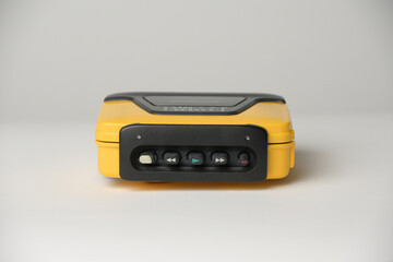 Fototapeta premium Retro cassette player with earbuds, 1990s