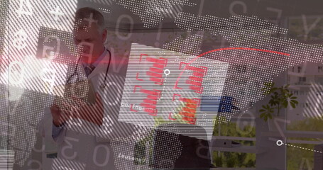 Holding tablet senior doctor examining world map charts in clinic with stethoscope and potted plant