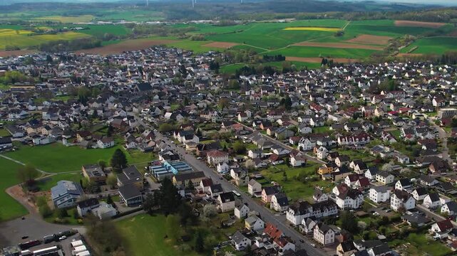 Aerial panorama view of the downtown city Hadamar in Germany on a cloudy afternoon in late summer