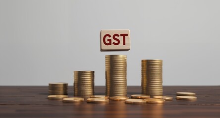 GST and Finances Stacks of Gold Coins With A Block Signifying Tax