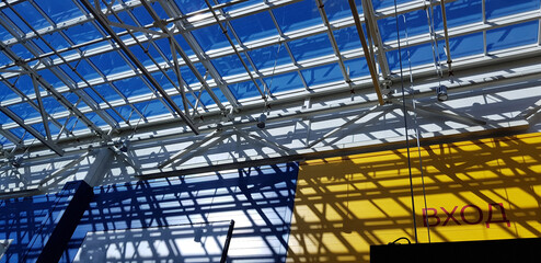 a modern interior with a bright play of light and shadow.  