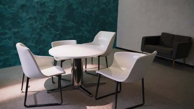 Rendered of Modern Office Lounge with Round Table and Chairs