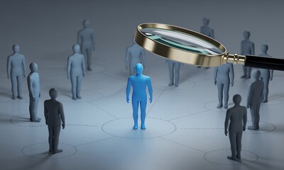 Magnifying Glass Focusing on a Single Figure in a Network of People