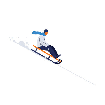 Man sledding down snowy hill on wooden toboggan during winter season enjoying outdoor recreation and winter sports.