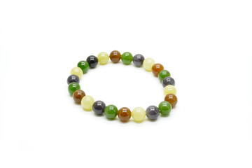 Nephrite jade bracelet isolated on white background.Multi Colors color Russian Nephrite jade. Siberian jade, rosary
