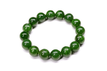 Nephrite jade bracelet isolated on white background. Natural Green color Russian Nephrite jade bracelet. Siberian jade, rosary