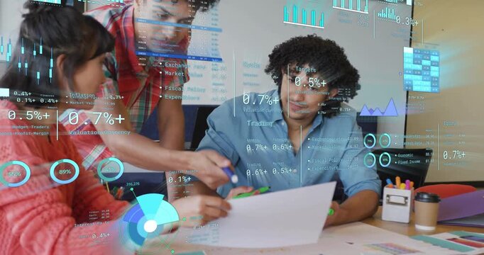 Three colleagues pointing to chart and highlighting figures as animated graphs appear for business