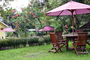 Obraz premium table and chairs in a garden