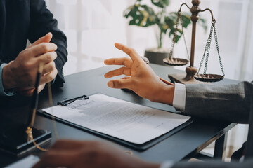 Lawyer explained to the client about the law that must be brought against the court case.