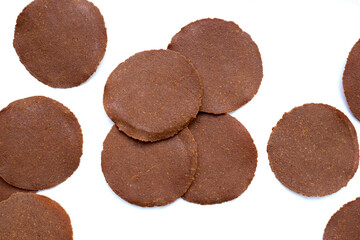 Fermented soybean discs, known as “Thua Nao,” a traditional Thai seasoning used to enhance flavor in Northern cuisine.
