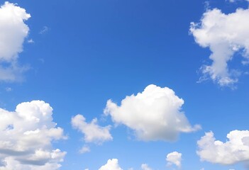 Obraz premium Vibrant blue sky, fluffy white clouds, lush green grass, landscape, carefree