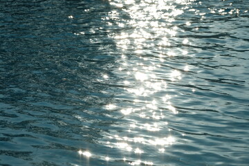 blue water ripples under the sun