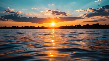 Obraz premium Sunset over a rippling river