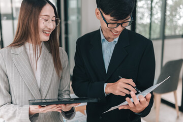 Close-up of professional collaboration young business partners in a creative office strategy session