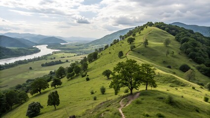 Fototapeta premium Green mountain ridge overlooking a winding river valley