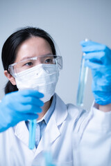 Fototapeta premium Woman doctor working in hospital laboratory research medicine test genetic analysis healthcare