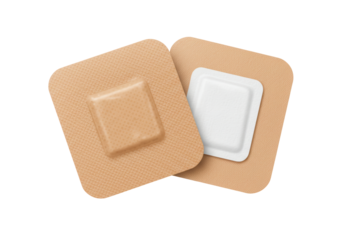Isolated close-up shot showcasing two tan-colored fabric adhesive bandages of varying sizes, featuring square absorbent pads and intricate fabric textures on a white background